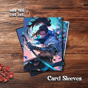 May include: Card sleeves featuring a warrior illustration with a sword. The sleeves measure 2.6 inches by 3.6 inches (66mm x 91mm). The text "Card Sleeves" is printed at the bottom. The background is a wooden surface.