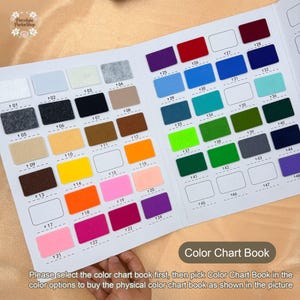 May include: A colour chart book displaying numerous numbered colour swatches in a range of hues, such as grey, black, brown, yellow, orange, pink, and purple. The text "Color Chart Book" is present. The image also contains the text: "Please select the color chart book first..."