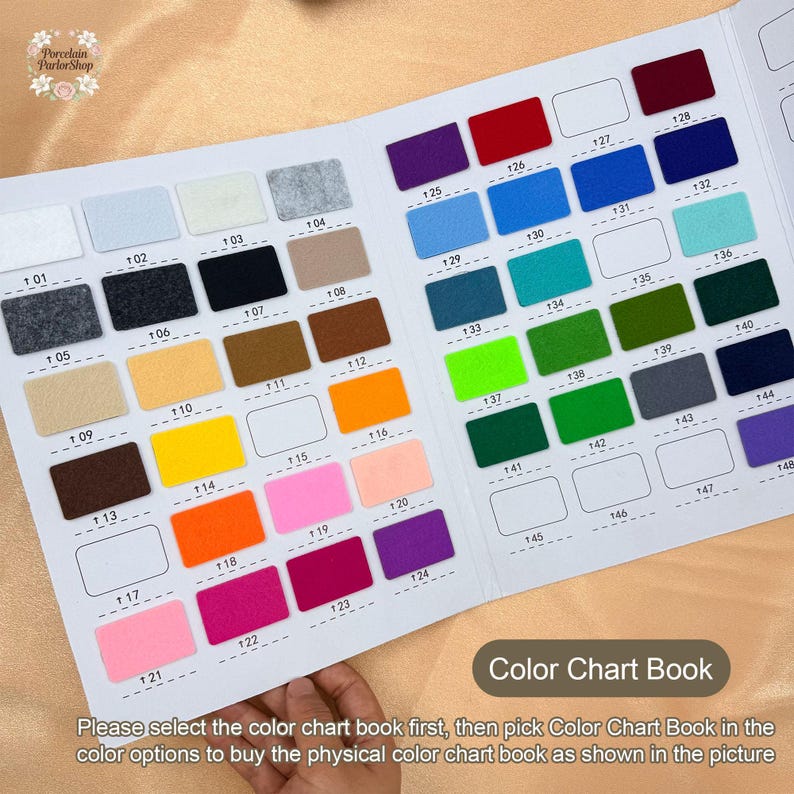 May include: A colour chart book displaying numerous numbered colour swatches in a range of hues, such as grey, black, brown, yellow, orange, pink, and purple. The text "Color Chart Book" is present. The image also contains the text: "Please select the color chart book first..."