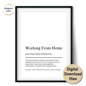 May include: A framed print with the text "Working From Home" in a black frame. The print includes a definition and humorous description of working from home, with a small circular logo in the upper left corner and a "Digital Download files" sticker in the lower right.