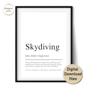 May include: A framed print with the word "Skydiving" in a bold font. The definition below describes skydiving as a graceful decision. The print also includes the text "Digital Download files". The print is in a black frame.