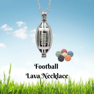 May include: Silver-colored football-shaped pendant necklace with a chain. The pendant is open, revealing a green stone inside. Several colorful lava beads are displayed next to the necklace. Text on the image reads "Football Lava Necklace."