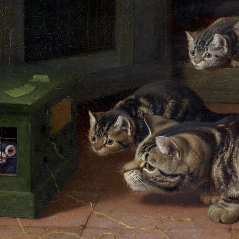 Close-up of the artwork showing three tabby cats and a green box