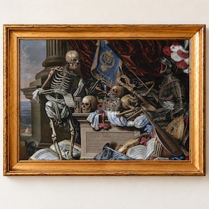 Vanitas Still Life with a Skeleton by Carstian Luyckx as a framed print in a gold frame. A seated skeleton holding a sheet of parchment leans on a stone pedestal crowded with skulls, a crown, an hourglass, a lute, a violin, books, a blue banner and a suit of armour under red velvet drapery.