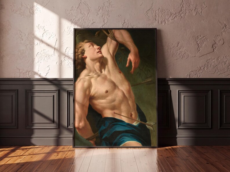 Baroque Saint Sebastian Martyr painting in a black frame on a textured wall