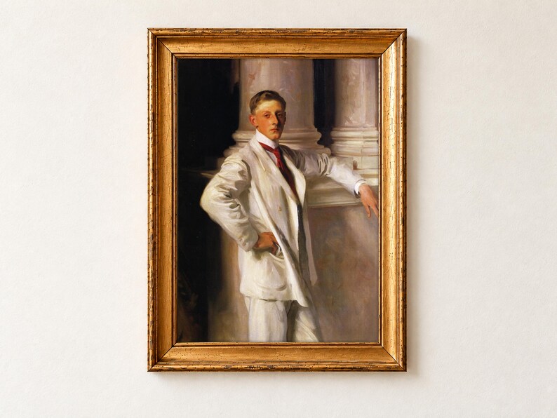 The Earl of Dalhousie by John Singer Sargent, 1900, as a framed print in an antique gold frame on a cream wall. A dark-haired boy in a cream suit and red tie stands confidently with one hand on his hip, leaning against a marble column.