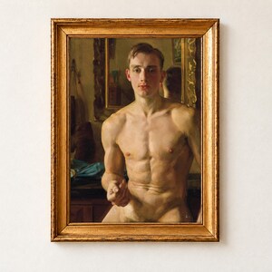 The Boxer by Konstantin Somov, 1933, as a framed print in an antique gold frame on a cream wall. A portrait of the young boxer Boris Snezhkovsky, a fair-haired, muscular figure painted in warm tones against a dark olive and gold interior.