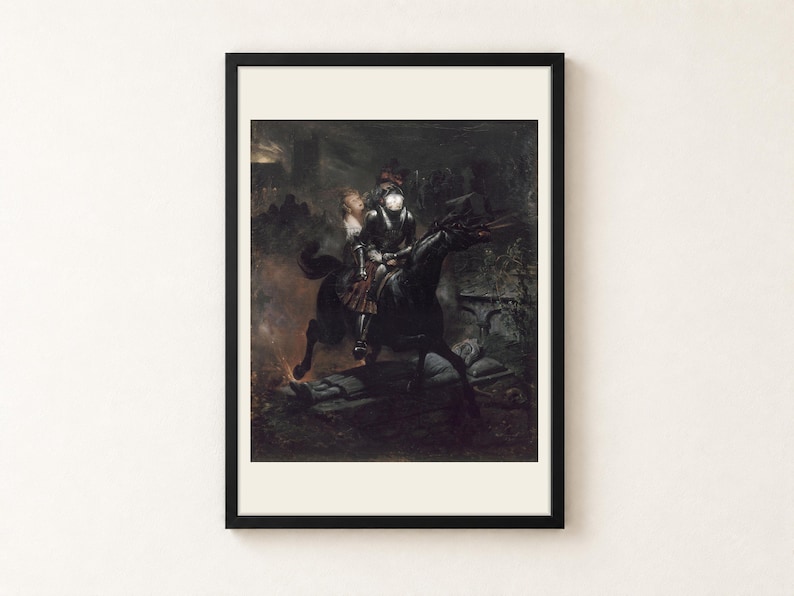 The Ballad of Lenore by Horace Vernet, 1839, as a framed print in a black frame on a cream wall. A skull-faced knight in armour gallops a black horse through a graveyard at night, a young woman in a white blouse clinging behind him, shown with a warm off-white border.
