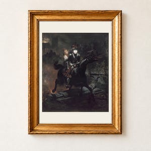 The Ballad of Lenore by Horace Vernet, 1839, as a framed print with a cream border in an antique gold frame on a cream wall. A pale young woman clings to a ghostly skeleton knight in dark armour as they ride a black horse through the night.