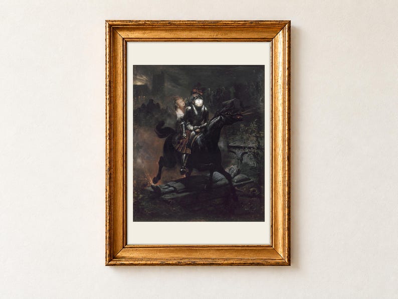 The Ballad of Lenore by Horace Vernet, 1839, as a framed print with a cream border in an antique gold frame on a cream wall. A pale young woman clings to a ghostly skeleton knight in dark armour as they ride a black horse through the night.