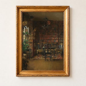 The Library of Thorvald Boeck by Harriet Backer, 1902, as a framed print in an antique gold frame on a cream wall. A quiet home library lined floor to ceiling with books, with carved wooden chairs around a table, a hanging chandelier and green plants by a sunlit window.