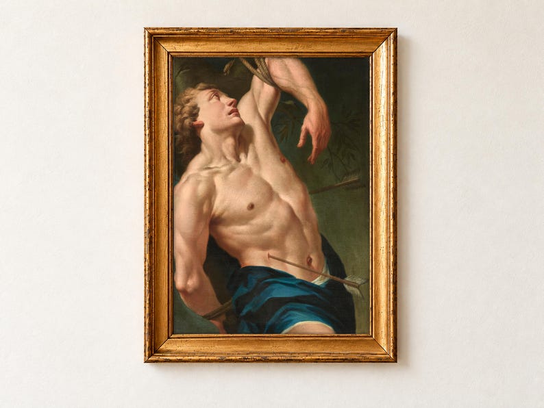 Saint Sebastian, North Italian School, c. 1700, as a framed print in an antique gold frame. A young man with his arms bound above his head looks upward, an arrow through his waist and deep blue drapery at his hips, against a dark green ground.