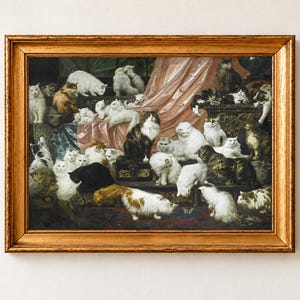My Wife's Lovers by Carl Kahler, 1891, as a framed print in an antique gold frame. Dozens of long-haired white, grey, tabby and ginger cats lounge across rose silk drapery, cushions and a carved dark chest above a patterned rug.