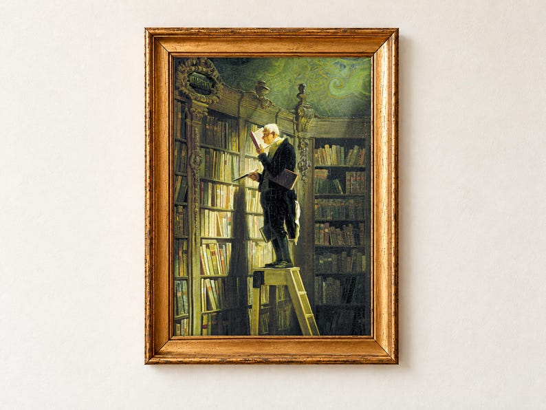 The Bookworm by Carl Spitzweg, c. 1850, as a framed print in an antique gold frame. An elderly scholar in a black tailcoat stands on a wooden library ladder, reading a book held close to his face, with a red book under his arm, below a gilded Metaphysik plaque and a green painted ceiling.