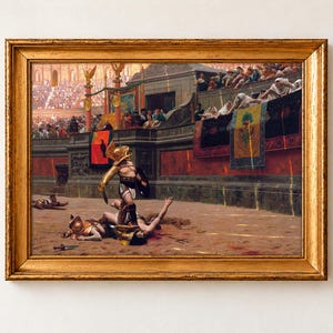 Pollice Verso by Jean-Léon Gérôme, 1872, as a framed print in a gold frame. A gladiator in a gold crested helmet stands over his fallen opponent in a sunlit arena, while women in white in the front row turn their thumbs down.