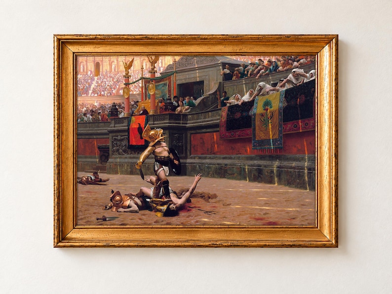 Pollice Verso by Jean-Léon Gérôme, 1872, as a framed print in a gold frame. A gladiator in a gold crested helmet stands over his fallen opponent in a sunlit arena, while women in white in the front row turn their thumbs down.