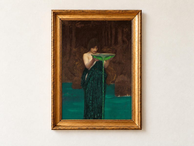 Circe Invidiosa by John William Waterhouse, 1892, as a framed print in an antique gold frame on a cream wall. The sorceress Circe, in a dark green gown, pours a glowing green poison from a bowl into the sea to transform her rival Scylla.