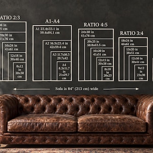 May include: A brown tufted leather sofa positioned below a wall chart displaying various print size ratios including 2:3, A1-A4, 4:5, 3:4, and 11x14. The chart lists dimensions in inches and centimeters, noting the sofa is 84 inches wide.