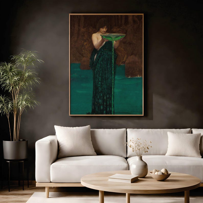 May include: A framed wall art print depicting a figure in a dark green robe holding a shallow bowl from which a vibrant green liquid pours downward into a pool of the same color, set against a dark, textured, and earthy brown background.