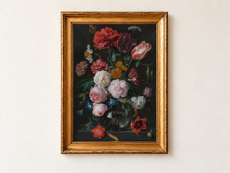 Vase of Flowers by Jan Davidsz de Heem as a framed print in an antique gold frame on a cream wall. A glass vase overflows with pink roses, striped tulips, red poppies and blue morning glories against a black background, a butterfly and a snail among the stems.
