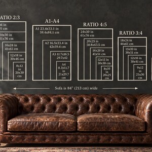 May include: A brown tufted leather sofa positioned below a wall chart displaying various print size ratios including 2:3, A1-A4, 4:5, 3:4, and 11x14. The chart lists dimensions in inches and centimeters, noting the sofa is 84 inches wide.
