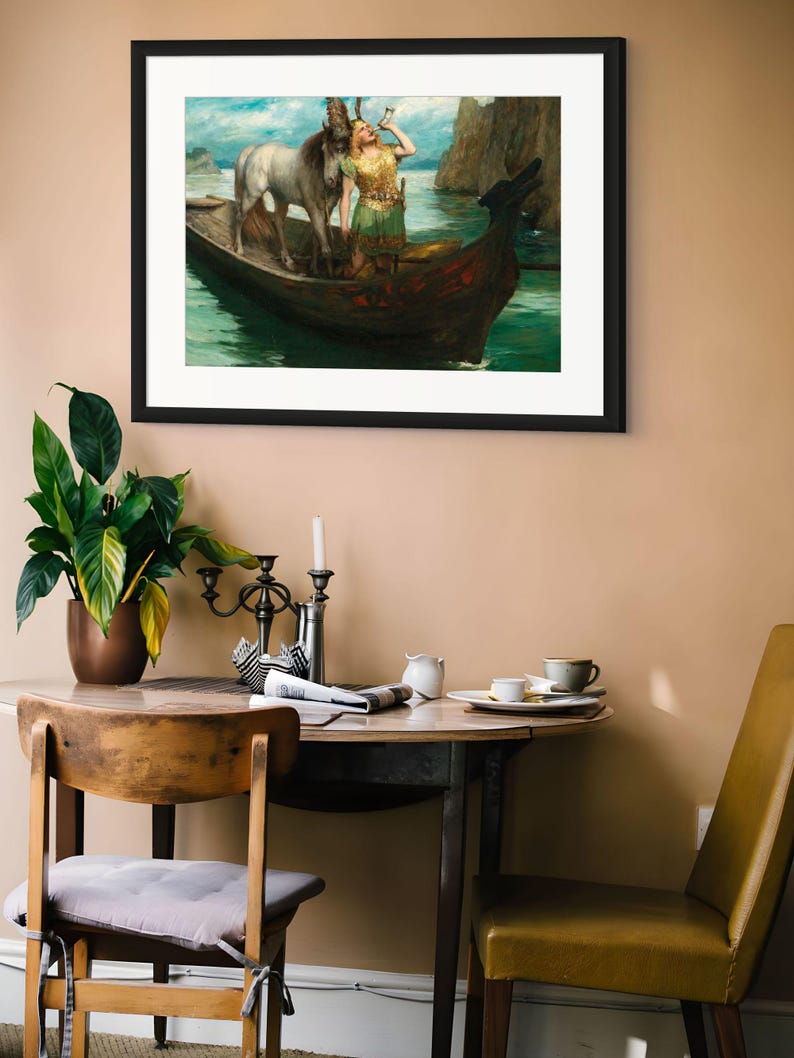 May include: A framed art print depicting a scene of a person in a green tunic standing in a wooden boat with a white horse, drinking from a horn. The boat is on water near rocky cliffs under a blue sky. The print is in a black frame.