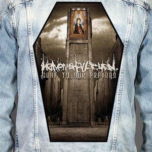 May include: A light blue denim jacket featuring a large, coffin-shaped back patch. The patch displays a tall, stone tower under a cloudy sky, with a small religious icon at the top and the text "HEAVEN SHALL BURN" and "DEAF TO OUR PRAYERS".