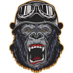 May include: Embroidered patch featuring a gorilla wearing a black motorcycle helmet and goggles. The gorilla has an open mouth, revealing teeth. The design uses black, gray, white, and yellow thread.