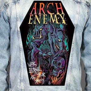May include: A light blue denim jacket featuring a large, coffin-shaped back patch. The patch displays the text ARCH ENEMY, WAR ETERNAL TOUR, and SACRIFICE, with a graphic illustration of a boar, a rat, a skull, and a hooded figure in flames.