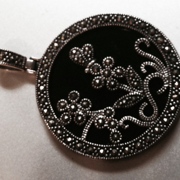 Sterling Silver 38mm Round Pendant with Polished Onyx and a Design made with Marcasite signed CFJ (66.153)