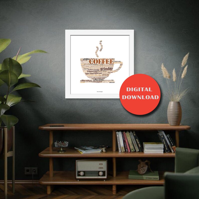 May include: White framed art print featuring a coffee cup design made of coffee-related words. The word "COFFEE" is prominent. A red circle with "DIGITAL DOWNLOAD" is in the lower right corner. The art is displayed on a dark gray wall.