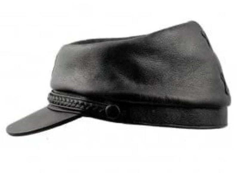 May include: Black leather cap with a short, curved brim. The cap features a braided band around the base and a button detail. The hat has a rounded crown and a smooth, matte finish.