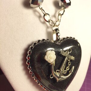 Resin Heart with an Embedded Silver Anchor and Rose Embellishment