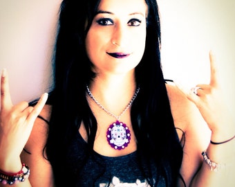 Large Colorful Sugar Skull Necklace on a Purple Frame