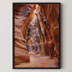 May include: A framed landscape painting shows a narrow canyon with high, textured rock walls in shades of brown, orange, and purple. Sunlight shines down the middle, lighting up the sandy floor. The artwork is in a black frame.