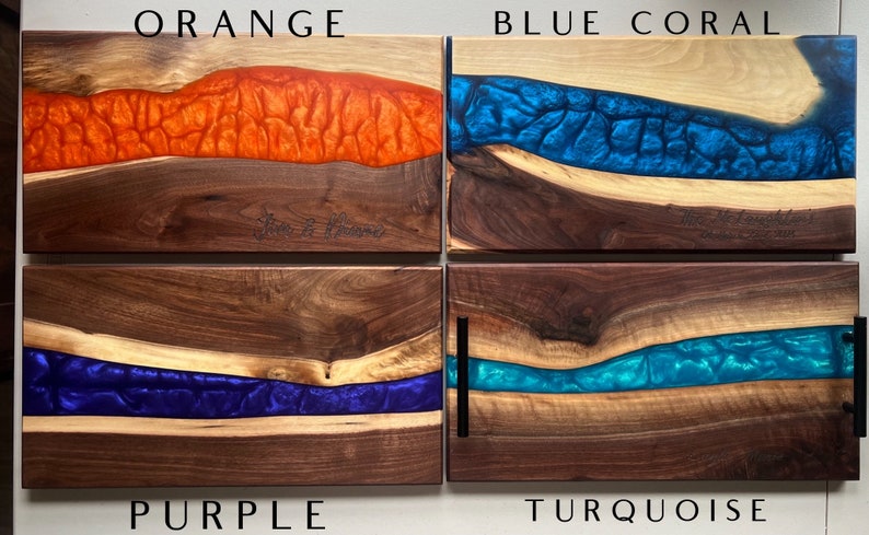 May include: Four wooden serving boards with different colored epoxy resin inlays. The boards are labeled "Orange", "Blue Coral", "Purple", and "Turquoise".