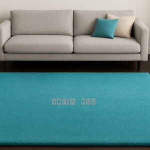 Handmade Turquoise Blue Wool Area Rug: Plush Solid Carpet