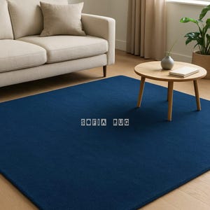 Handmade Dark Blue Wool Area Rug: Plush Solid Design
