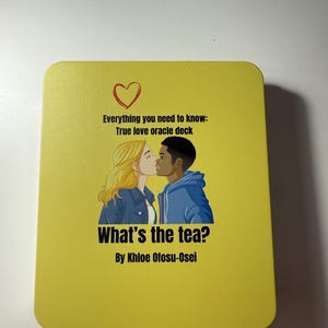 May include: A yellow oracle deck box with the text "Everything you need to know: True love oracle deck" and "What's the tea?" A drawing of a kissing couple is featured on the box. The author's name, Khloe Ofosu-Osei, is also printed.