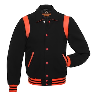 May include: Black varsity jacket with orange accents on the shoulders, pockets, and cuffs. The jacket features a button-up front, a ribbed hem, and the text "NESTVOGUE GOODS" on the collar.