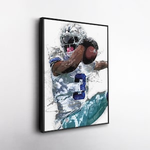 May include: Framed artwork of an American football player in action, catching a football. The player is wearing a silver helmet and a white and blue uniform with the number 3. The artwork has a watercolor effect.