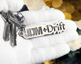 Llavero JDM Drift: accesorio premium de acero inoxidable para entusiastas de los automóviles y fanáticos de la cultura del drift.