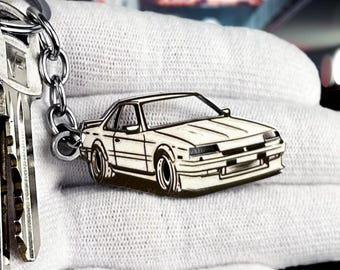 Llavero Nissan Skyline: accesorio JDM premium de acero inoxidable para entusiastas de los autos y fanáticos del Skyline.