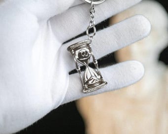 Llavero reloj de arena Memento mori & memento vivere