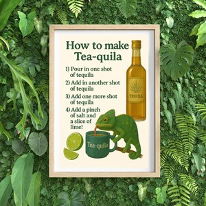 May include: A framed print with the text "How to make Tea-quila" and instructions. It features a bottle of tequila, a green chameleon, a mug, and lime slices. The background is a lush green wall of plants.