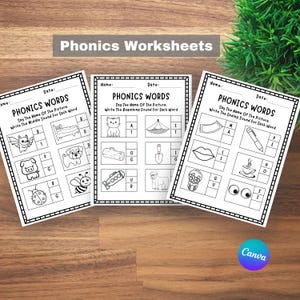 May include: Three white Phonics Worksheets on a wooden surface. Each worksheet has the title "Phonics Words" and includes illustrations with letter prompts for writing the beginning, middle, or ending sounds of words. The text "Canva" is in the bottom right corner.
