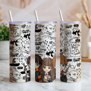 May include: Three stainless steel tumblers with white straws. Each tumbler features a cream-colored background with black and white illustrations and text from the Harry Potter series. The text includes "I Solemnly Swear That I'm up to no Good."
