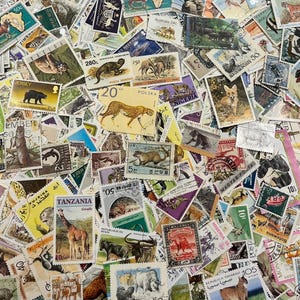 Animals vintage stamp packs of 25 - Worldwide off paper