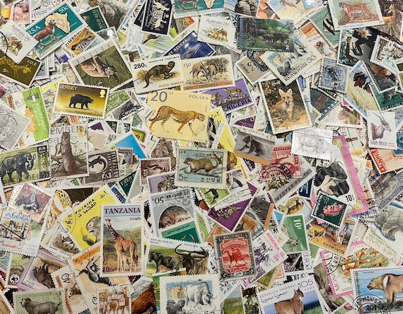 Animals vintage stamp packs of 25 - Worldwide off paper