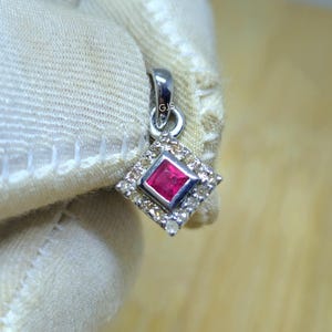 Genuine Ruby Pendant: Flower Design Sterling Silver Pendant Necklace